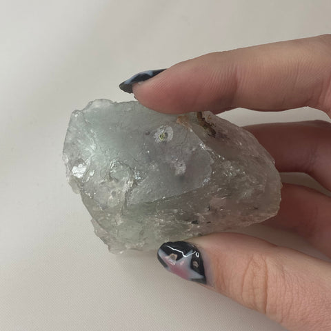 Fluorite chunk with malachite inclusions